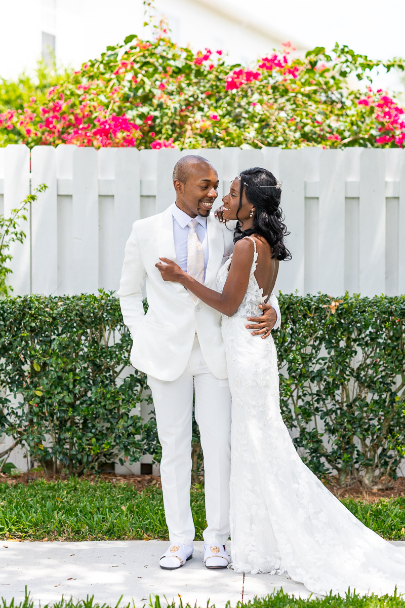 Cypress Grove Estate House Wedding | Florida Wedding Photographer | Bride in Groom under Bougainvillea