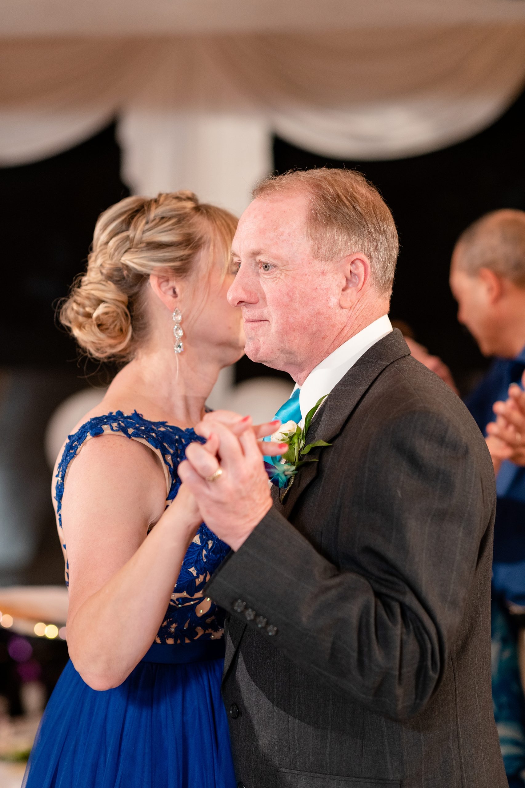 Bride's parents dance at wedding